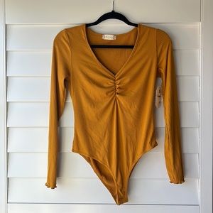Altar’d State Mustard Body Suit